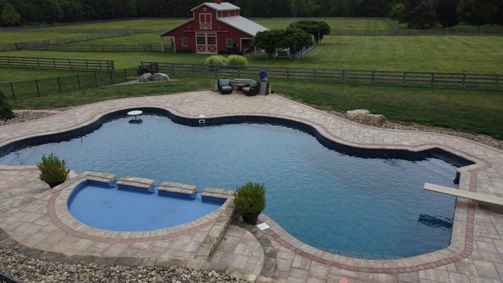 An aerial view of an inground pool.